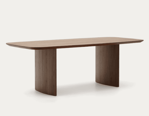 A modern rectangular dining table featuring a solid wood construction in a dark brown finish. The tabletop has softened, rounded corners, and it is supported by two substantial, curved pedestal bases, creating a minimalist and elegant aesthetic. — 3D model