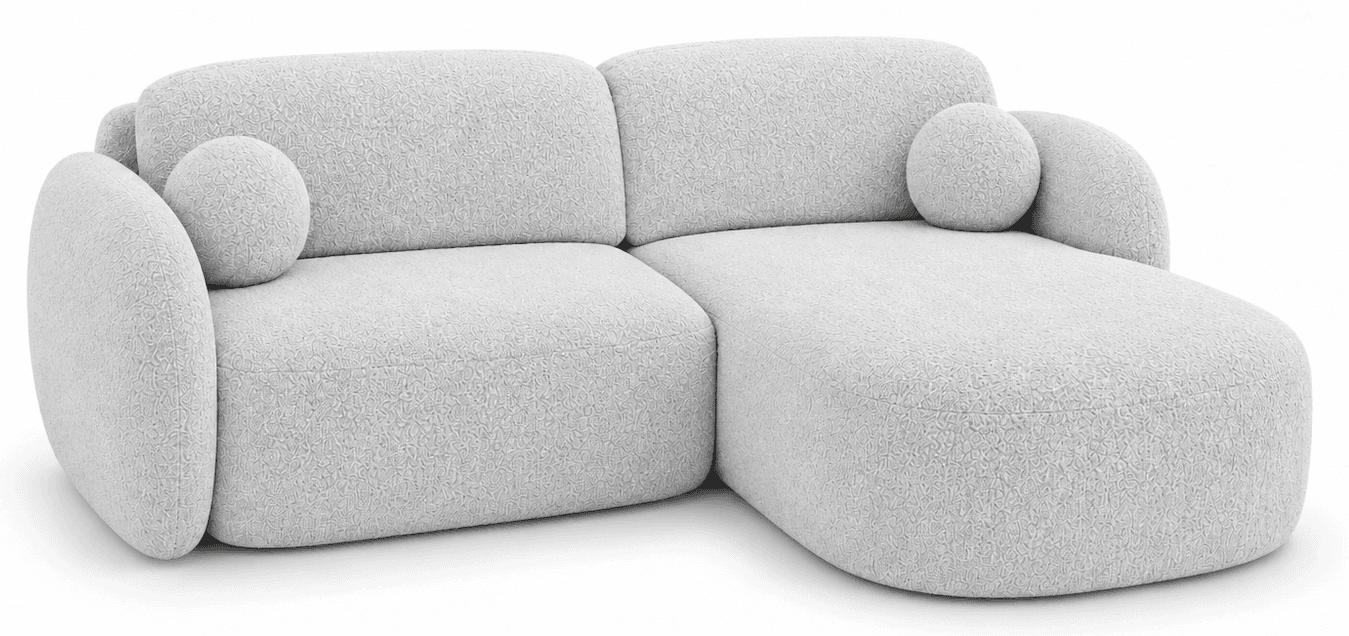 An L-shaped contemporary sectional sofa featuring soft, rounded contours and upholstered in a light, textured fabric, accompanied by two spherical accent cushions. — 3D model