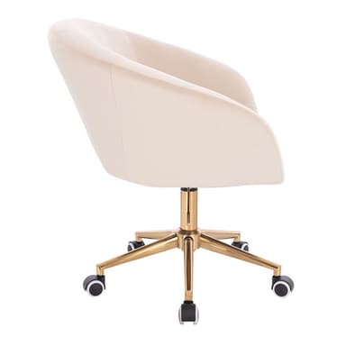 A cream-colored velvet desk chair with a curved backrest and armrests. It features a gold-tone metal base with five legs, each equipped with a caster wheel for mobility. The chair has a central gas lift mechanism for height adjustment. — 3D model