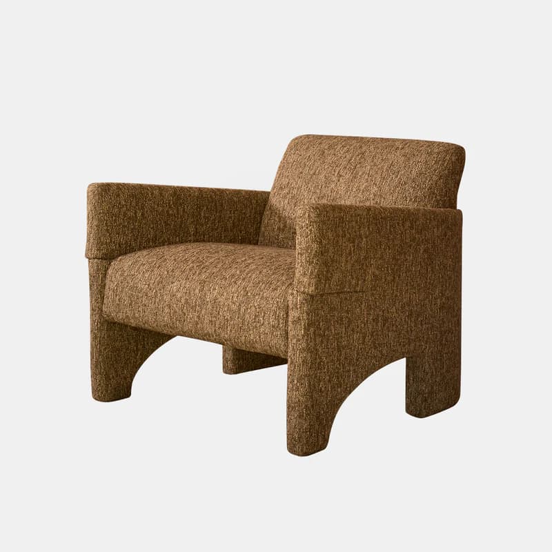A modern, upholstered armchair featuring a distinctive sculptural form, wide integrated arms, and a sturdy base with curved cut-outs. It is covered in a textured, brown fabric, presenting a contemporary aesthetic. — 3D model