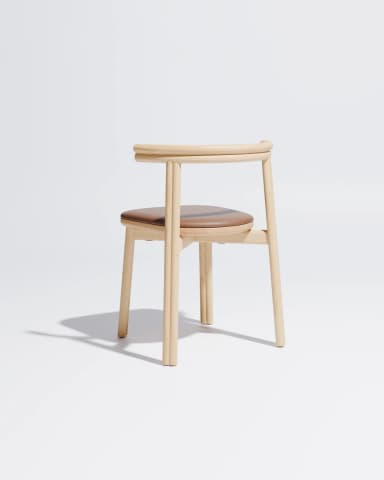A minimalist chair made from light-colored wood featuring a gently curved backrest that integrates into armrests, and a padded brown leatherette seat. — 3D model