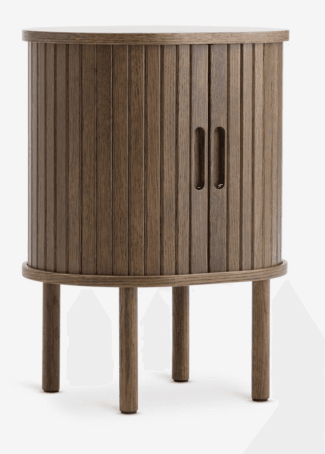 A modern, cylindrical cabinet crafted from medium-toned wood, featuring slatted tambour doors with integrated recessed pull handles. It stands on four short, tapered legs and has a flat top surface. — 3D model