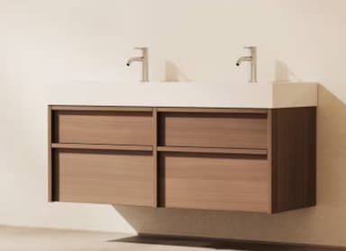 A modern wall-mounted double bathroom vanity featuring a light wood-grain cabinet, a white integrated countertop with two sinks, and two contemporary brushed metal single-handle faucets. The cabinet has four drawers arranged in two columns, each appearing handleless for a sleek aesthetic. — 3D model