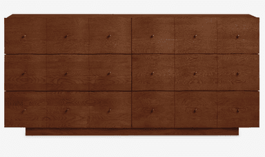 A long, low, rectangular wooden credenza or sideboard with a warm, medium-brown finish and visible wood grain. The front facade is composed of multiple individual panels, each fitted with a small, circular brass knob. The unit sits on a recessed plinth base, giving it a sleek, minimalist appearance. — 3D model