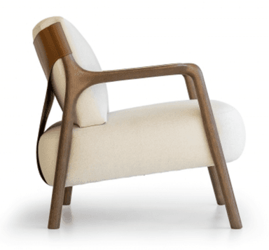 A modern upholstered lounge chair viewed from the back. It features a light-colored fabric on the seat and back cushions, supported by a dark wooden frame. A broad, saddle-brown leather or faux leather strap forms the outer backrest, wrapping around the wooden uprights and secured with visible stitching. The chair appears to be well-constructed with clean lines. — 3D model