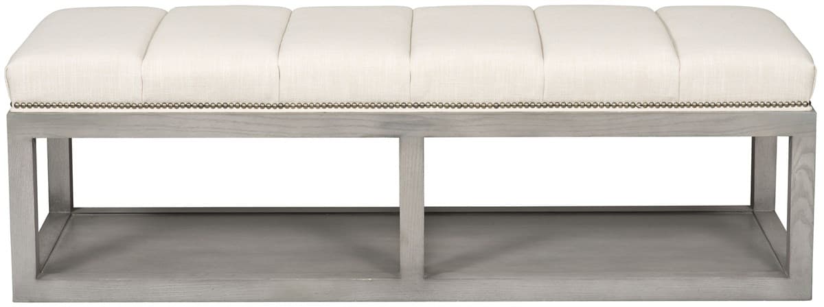 A rectangular bench featuring a channeled upholstered top in a light fabric, accented with decorative nailhead trim. The bench is supported by an open, rectangular wood frame with a washed grey finish, and includes an integrated lower shelf. — 3D model