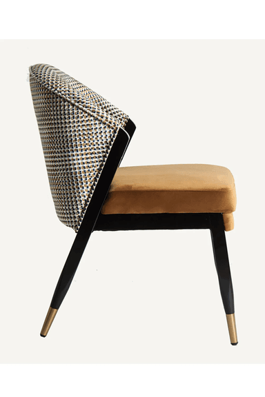 An armchair with a curved backrest upholstered in a patterned fabric, and a seat upholstered in brown velvet. The chair has four tapered legs with a glossy black finish and brass-colored caps at the bottom. — 3D model