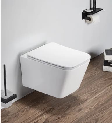 A modern, wall-mounted toilet with a clean, minimalist design. The toilet features a concealed cistern (not visible in this image) and a soft-close seat and lid. The overall shape is angular and rectangular with softened corners. It appears to be designed for a contemporary bathroom aesthetic. — 3D model