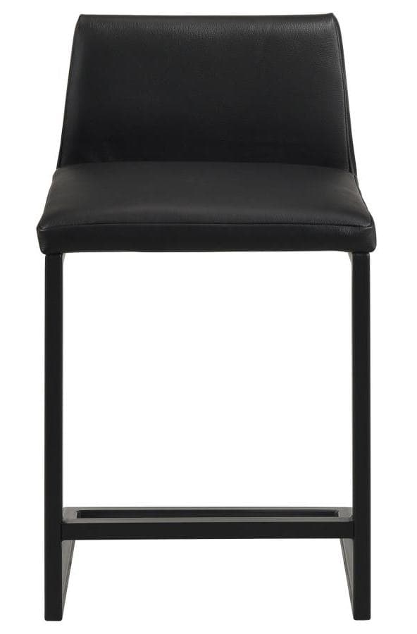 A contemporary black bar stool featuring a sleek, armless design. It consists of a padded seat and a slightly tapered backrest, both upholstered in black material, likely faux leather or PU. The stool is supported by a square-profile black metal frame, which includes an integrated footrest for comfort. The overall aesthetic is minimalist and modern. — 3D model