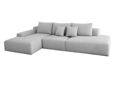 A light gray modular sectional sofa featuring a chaise lounge extension. The sofa consists of multiple low-profile, upholstered sections that can be arranged in an L-shape. It includes several loose back cushions and two smaller accent pillows, all in a matching light gray fabric. The design is clean, minimalist, and contemporary, with no visible legs, giving it a solid, grounded appearance. — 3D model