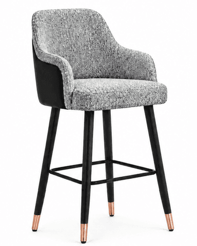 A tall, upholstered bar stool featuring a contoured seat and backrest with integrated armrests, covered in a gray and white patterned fabric. It stands on four tapered black legs with copper-finished feet and includes a black metal footrest. — 3D model