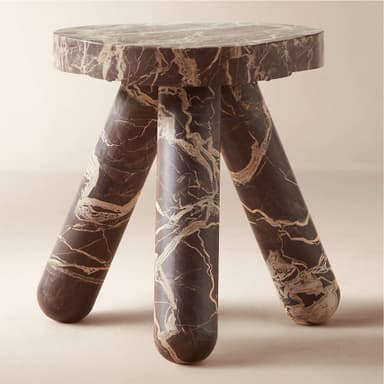 A round side table with a thick, beveled edge top. The table is constructed entirely from marble, featuring a rich burgundy base color with striking white and tan veining throughout the surface and base. The visible base suggests a pedestal or column design. — 3D model