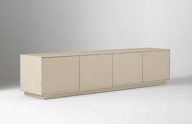 A long, low-profile contemporary sideboard cabinet featuring four handleless doors, finished in a light greige lacquer. The unit rests on a subtly recessed plinth base, giving it a floating appearance. Its minimalist design emphasizes clean lines and a smooth, uninterrupted facade. — 3D model