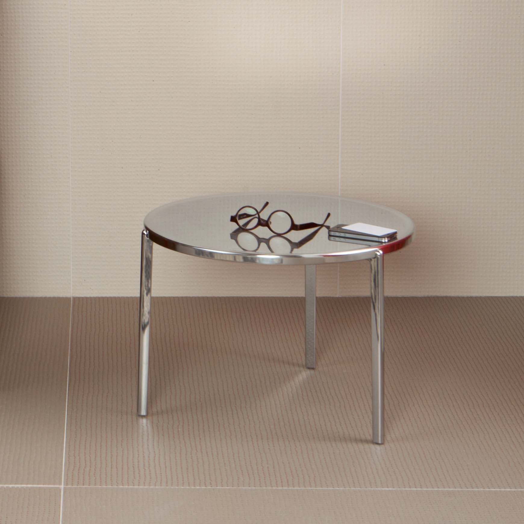 A modern circular accent table featuring a mirrored glass top and a minimalist three-leg chrome metal frame. The table has a clean, reflective aesthetic. — 3D model