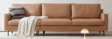 A modern three-seater sofa upholstered in tan-colored leather or faux leather, featuring a minimalist design with clean lines, square armrests, and slender black metal legs. The sofa consists of three individual seat cushions and three matching back cushions, providing a streamlined and contemporary aesthetic. The overall condition appears new. — 3D model