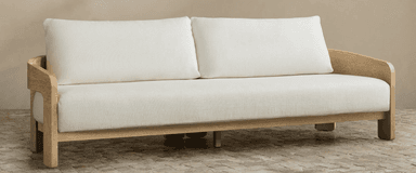 A two-seater loveseat featuring a distinct exposed wooden frame made of light-toned oak. It is upholstered with off-white fabric cushions for both the seat and back, providing a minimalist and contemporary aesthetic. The armrests are integrated into the curved wooden frame, presenting a clean, open design. — 3D model