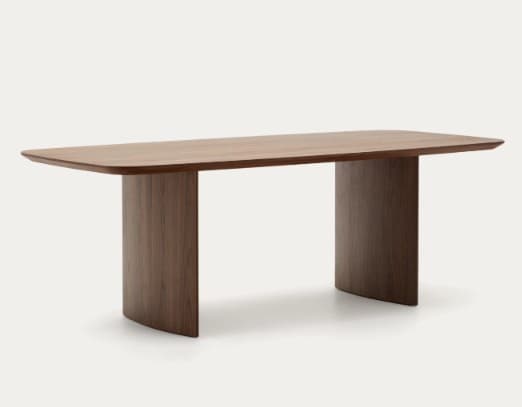 The image displays a modern rectangular dining table constructed entirely from wood. It features a sleek, thin tabletop with subtly rounded corners, supported by two substantial, vertically oriented panel legs. These legs are positioned closer to the ends of the table, creating a spacious central area for seating. The wood has a dark, rich brown tone, possibly walnut, with a visible grain pattern. The design emphasizes clean lines and a minimalist aesthetic. — 3D model