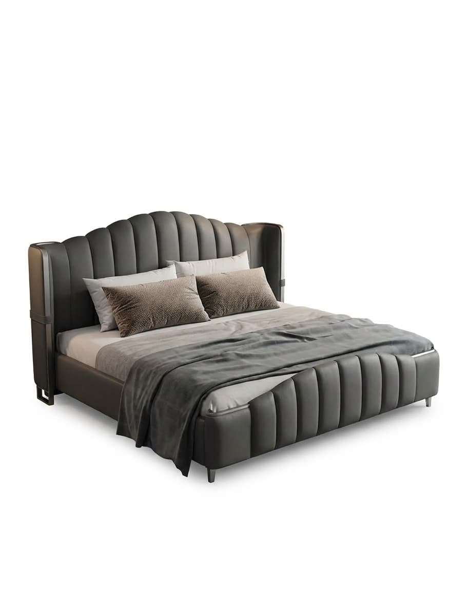 A contemporary upholstered platform bed featuring a dark gray material, likely leather or faux leather. The headboard is distinctly scalloped along its top edge and features vertical channel tufting. The footboard and side rails also exhibit matching vertical fluting, creating a cohesive and luxurious aesthetic. The bed stands on small, recessed cylindrical metal legs, contributing to its modern, low-profile design. It is adorned with a mattress, pillows, and a throw blanket. — 3D model