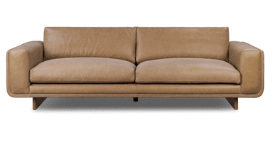 A modern two-seater sofa upholstered in tan leather, featuring clean lines, thick cushions, and subtly rounded arm details, supported by recessed dark wood block legs. — 3D model