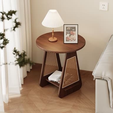 A compact round accent table constructed from dark wood, likely walnut, featuring a cane webbing design integrated into its splayed, triangular leg structure. It includes a lower shelf for storage or display. — 3D model