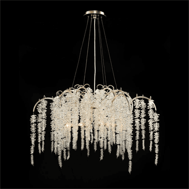 A chandelier designed to mimic cascading foliage, featuring a metallic frame from which numerous strands of clear, crystalline elements hang. The overall form is reminiscent of weeping willow branches or icicles, with light sources integrated within the upper structure to illuminate the decorative elements. — 3D model