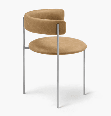 A modern armless dining chair featuring a circular upholstered seat and a curved, semi-circular upholstered backrest, supported by a minimalist silver-colored metal frame with four slender legs. — 3D model