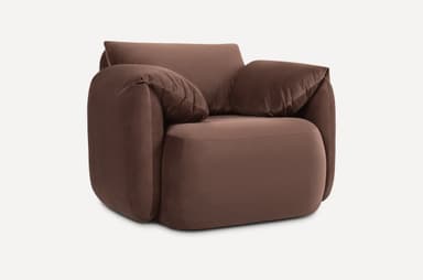 A contemporary armchair with plush upholstery and generous cushioning. The armchair features rounded edges and deep, inviting seat and backrest areas, complemented by loose back cushions that add to its comfortable and relaxed aesthetic. It is presented against a neutral background. — 3D model