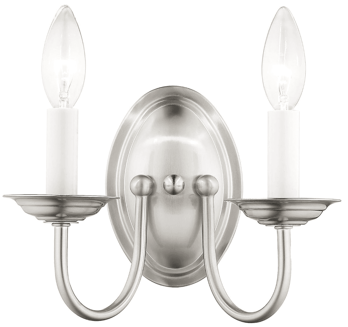 A two-light wall sconce in a brushed nickel finish, featuring an oval backplate and two U-shaped arms supporting candle-style lamp holders with candelabra bulbs. — 3D model