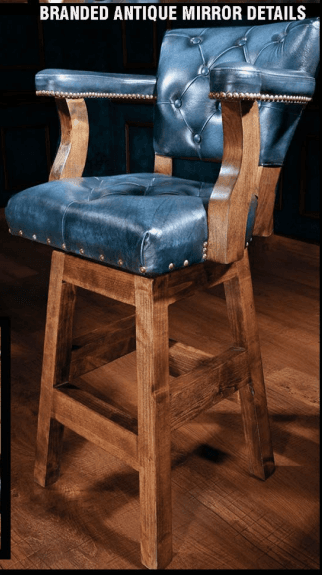 A traditional style bar stool featuring a sturdy wooden frame, blue tufted leatherette upholstery, and integrated armrests. The seat is accented with brass nailhead trim and includes a swivel mechanism. — 3D model