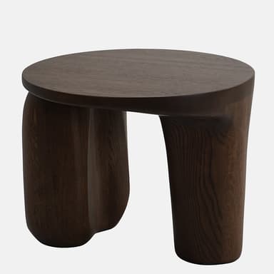 A dark brown wooden end table with a circular top and three organically shaped, curved legs that are thicker at the base and taper slightly towards the top. The wood grain is visible, suggesting it is a solid wood construction. The overall design is modern and sculptural. — 3D model