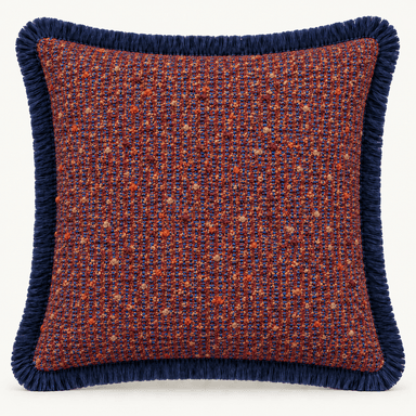 A square throw pillow featuring a textured tweed fabric in a mix of terracotta red and navy blue hues, finished with a navy blue fringe trim along all four edges. — 3D model