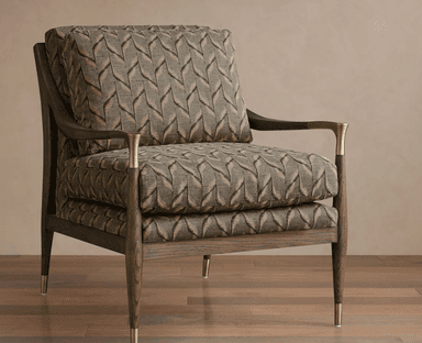 A sophisticated lounge chair featuring an exposed dark-stained wooden frame with a distinct geometric upholstered pattern. The chair has two substantial loose cushions for the seat and back, providing comfort. The armrests are elegantly curved wood, capped with brass details where they meet the front legs. The tapered wooden legs are also finished with subtle brass ferrules, adding a touch of metallic accent to the overall design. — 3D model