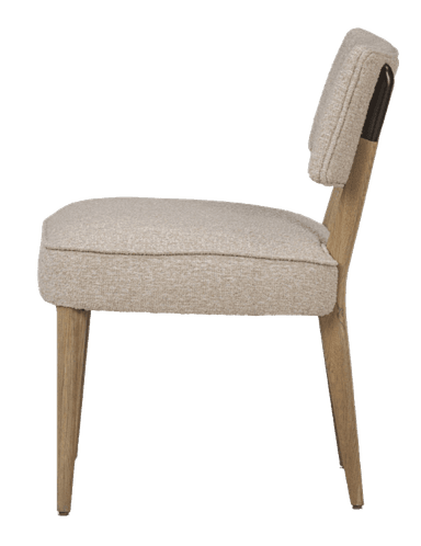 A view of the back of a upholstered armchair. The chair features a curved backrest and a cushioned seat. The legs and armrest accents are made of wood. The upholstery appears to be a textured, light-colored fabric. — 3D model