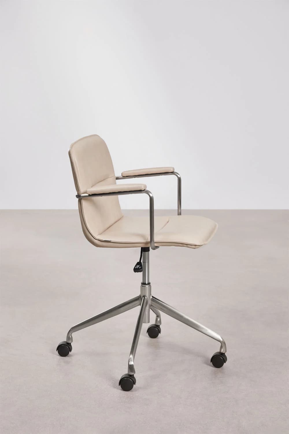 A modern office chair with a light beige upholstered seat and backrest, supported by a polished metal five-star base with casters. The chair features armrests with a similar metal frame and upholstered pads. A lever for height adjustment is visible beneath the seat. — 3D model