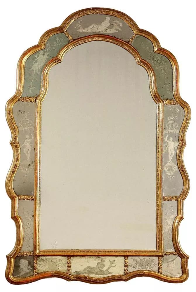A decorative mirror with a shaped frame. The frame is gilded and features inlaid panels with etched or painted classical figures and motifs on a light blue background. The overall shape is arched with a scalloped outline. — 3D model