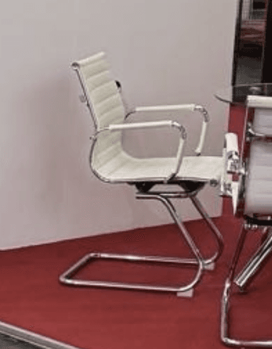 A modern white ribbed armchair featuring a distinctive sled base and integrated armrests, rendered against a plain white background. The chair has a minimalist aesthetic, with horizontal ribs on both the seat and backrest providing texture and a streamlined appearance. The frame and armrests are constructed from polished chrome-plated metal, creating a sleek contrast with the white upholstery. — 3D model