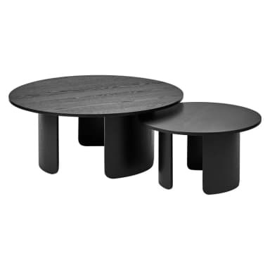 A circular black table top with a prominent, yet subtle, wood grain pattern visible across its surface. The grain runs diagonally, contributing to the depth of the dark finish. The edges appear smooth and uniformly curved, indicating a precisely cut or molded form. The overall aesthetic is sleek and modern. — 3D model