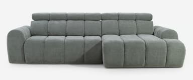 A modular sectional sofa with a modern design. It features a channel-tufted upholstery with rounded edges on the arms and base. The backrests are composed of individual, horizontally segmented cushions, and the headrests are separate, cylindrical cushions that can be adjusted. The sectional configuration includes an L-shaped chaise lounge. — 3D model