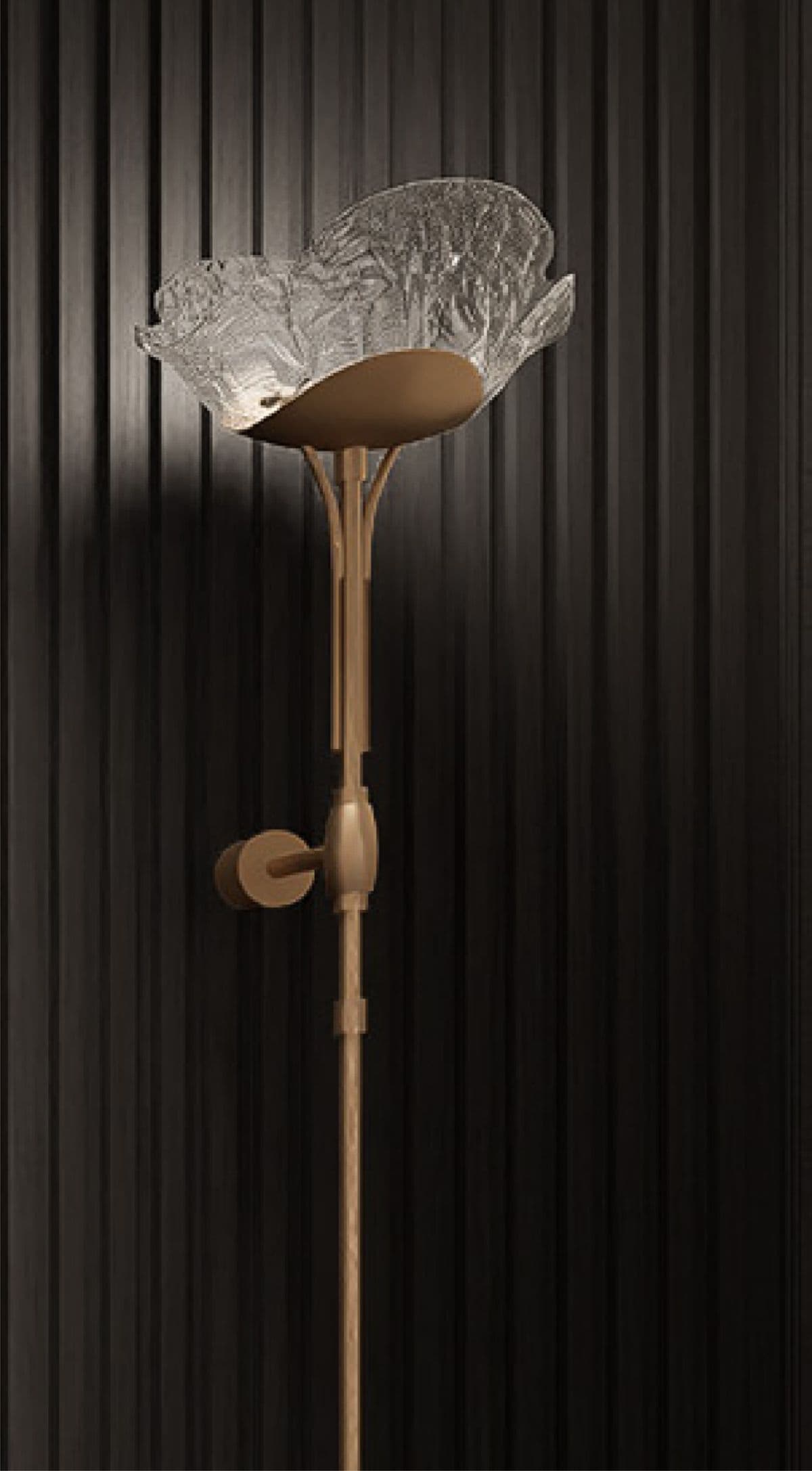A tall, slender floor lamp featuring a metallic bronze or gold-finished base and stem, topped with a distinct, upward-facing, textured glass shade shaped like an opening flower. The stem appears to have an adjustable section. — 3D model