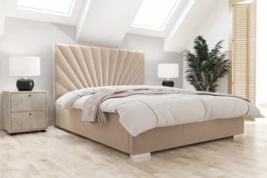 A modern upholstered bed frame with a rectangular base and a headboard featuring a fan-like pleated design. The bed is shown with a white mattress. The frame is low-profile, resting on four short, white, block-style legs. The upholstery appears to be a soft fabric. — 3D model