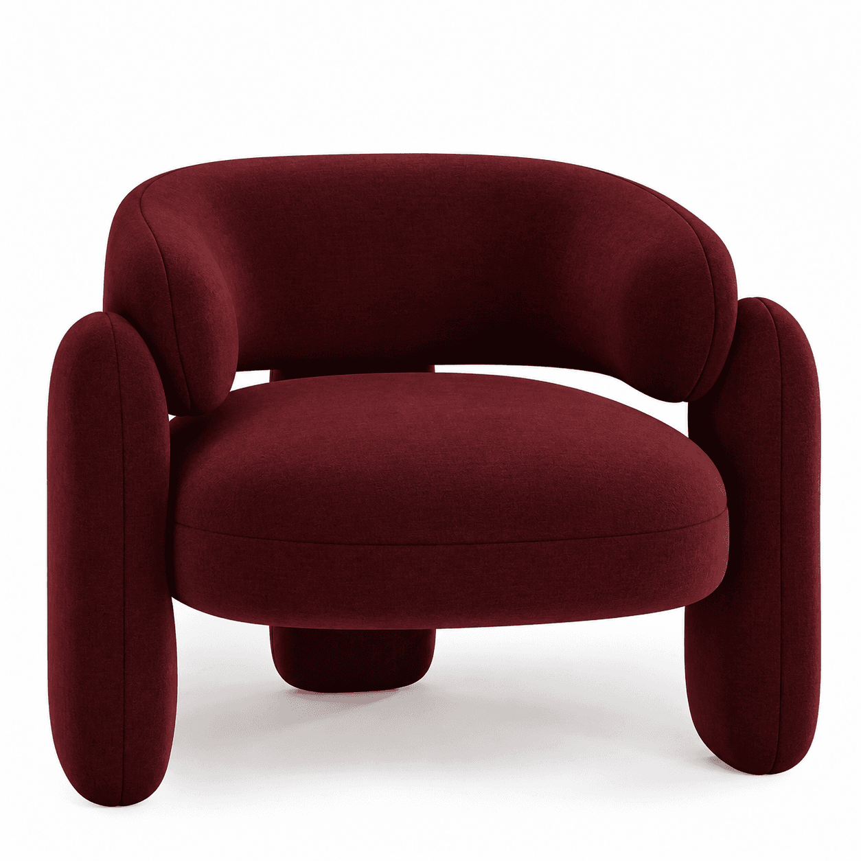 A contemporary lounge chair featuring a distinctive rounded and plush form, upholstered in a rich deep red fabric. The design emphasizes soft, curvilinear lines, with integrated arms and legs that contribute to a cohesive and sculptural aesthetic. The chair appears to be generously padded for comfort, suggesting it is intended for relaxed seating in a modern interior. — 3D model