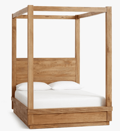 A sturdy wooden bed frame featuring a full canopy structure, four substantial corner posts, and a solid headboard. The wood displays a natural grain and a light, warm finish, with the headboard incorporating vertical carved elements. — 3D model