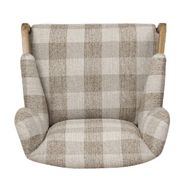 A contemporary wingback armchair featuring a high back with distinctive side wings, upholstered in a light-toned plaid fabric. The chair has an exposed wooden frame with gracefully curved armrests and tapered legs. The upholstery pattern consists of beige, light brown, and off-white squares, creating a warm and inviting appearance. The wooden elements appear to be light-colored oak or a similar wood, providing a natural contrast to the fabric. — 3D model