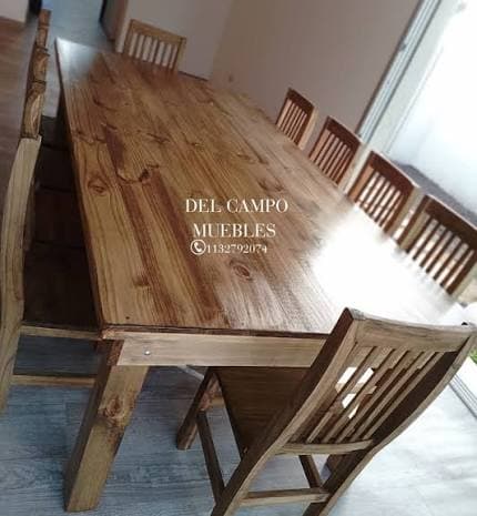 A simple rectangular dining table constructed entirely from light-colored solid wood, featuring a flat top surface and four sturdy, square-profile legs. — 3D model
