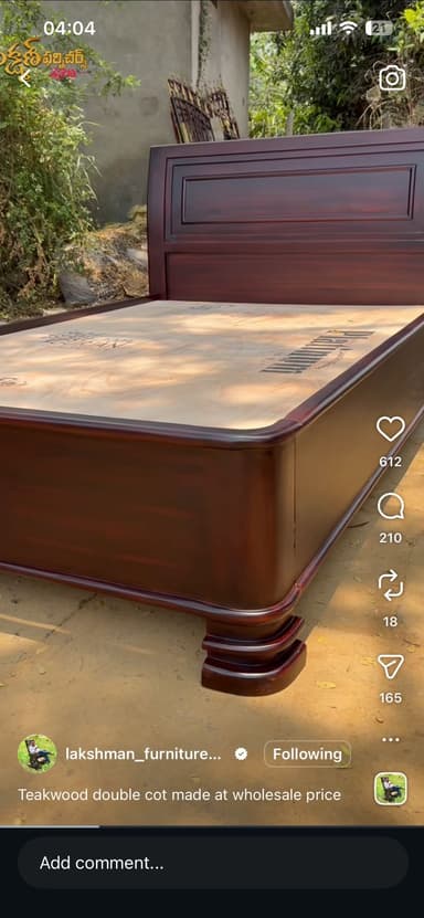 A traditional wooden bed frame with a dark reddish-brown finish. It features a paneled headboard and turned legs at the footboard end. The mattress support base consists of light-colored wood slats. — 3D model
