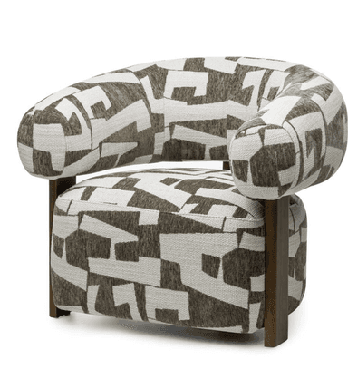 An upholstered barrel-back accent chair featuring a continuous rounded back and arms. The chair is covered in a textured fabric with a striking geometric abstract pattern in off-white and dark brown/gray. It is supported by visible, square-profile dark wood legs at the sides and back, presenting a modern and distinctive aesthetic. — 3D model