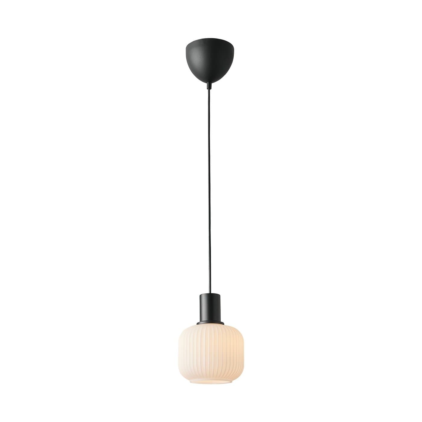 A contemporary pendant light fixture featuring a matte black ceiling canopy connected by a thin black cable to a matte black socket and a ribbed, frosted glass shade. The shade has a rounded, slightly elongated barrel shape. — 3D model
