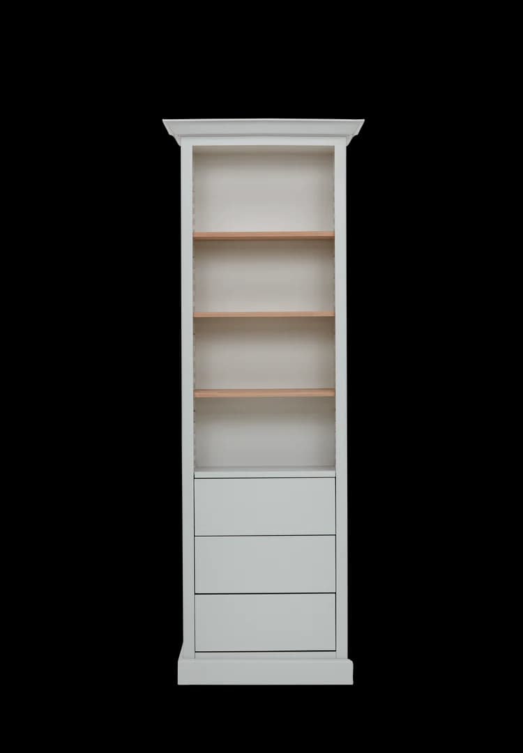 A tall, narrow, white bookcase with a decorative top molding. It features four open shelves with natural wood-colored shelves and a base section with three drawers. The overall design suggests a contemporary or transitional style. — 3D model