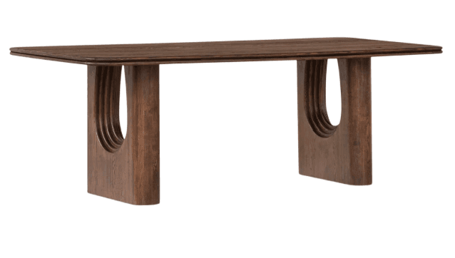 A dark wood dining table with a rectangular top and two substantial, solid legs. The legs are designed with a distinctive, vertically oriented oval cutout that features a series of concentric ridges, adding a sculptural element to the otherwise minimalist form. The edges of the tabletop appear slightly rounded. — 3D model