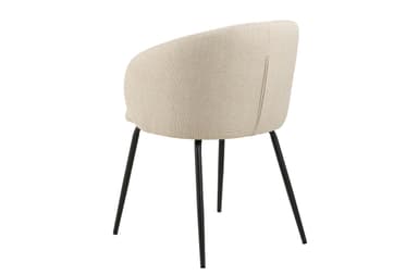 A contemporary dining armchair featuring a bucket-style seat and integrated armrests, all upholstered in a light beige, textured fabric. The chair is supported by four slender, tapered black metal legs. — 3D model